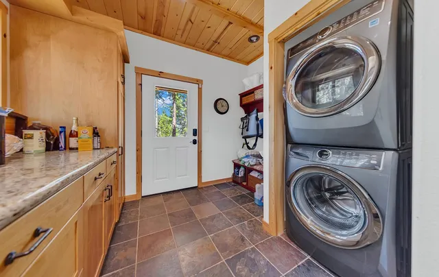 a view of a storage & utility room with a sink