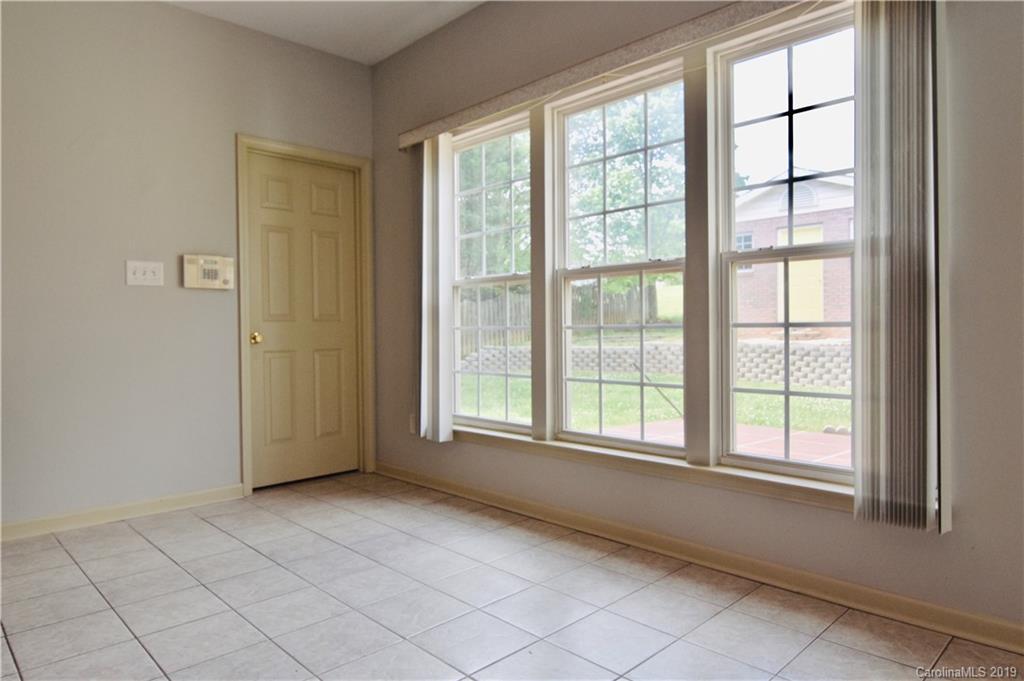 509 Circle Trace Road Monroe, NC 28110 - Photo 12 of 36 an empty room with windows