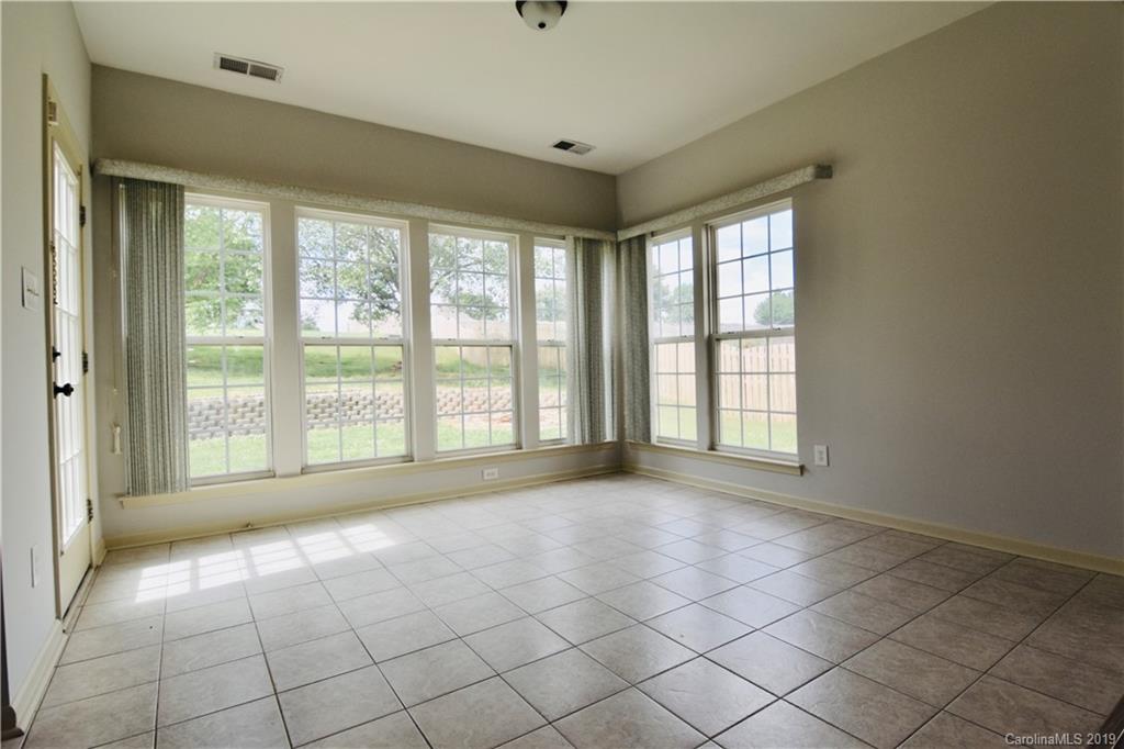 509 Circle Trace Road Monroe, NC 28110 - Photo 13 of 36 a view of an empty room with a window