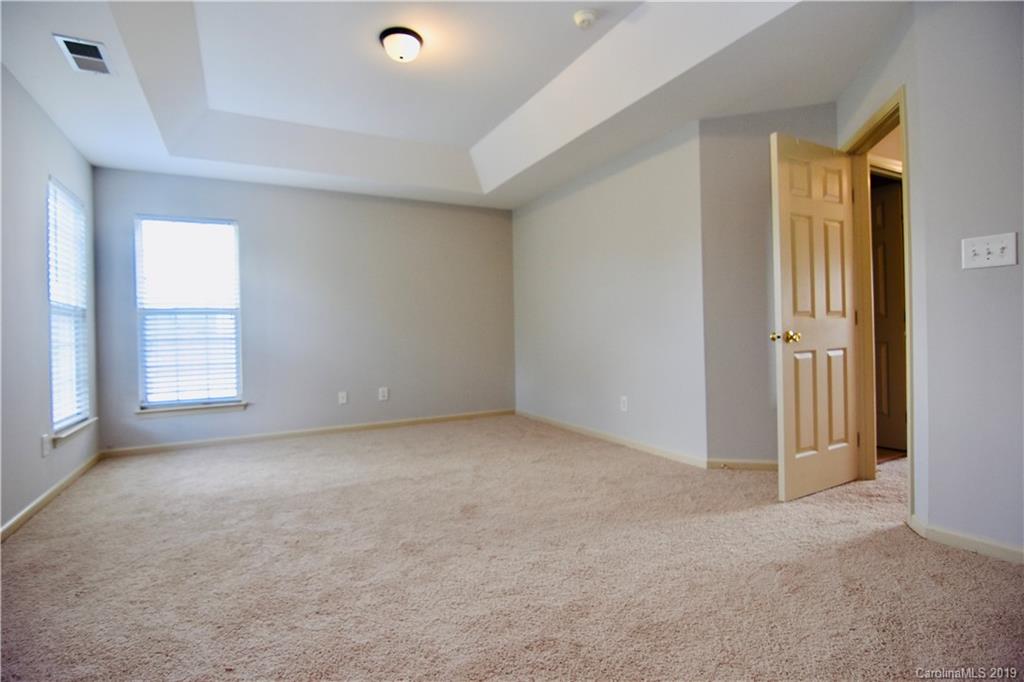 509 Circle Trace Road Monroe, NC 28110 - Photo 20 of 36 an empty room with windows and closet