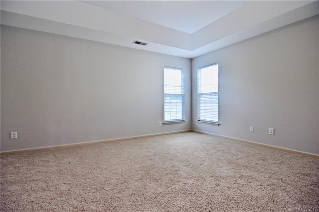 509 Circle Trace Road Monroe, NC 28110 - Photo 21 of 36 a view of an empty room with a window
