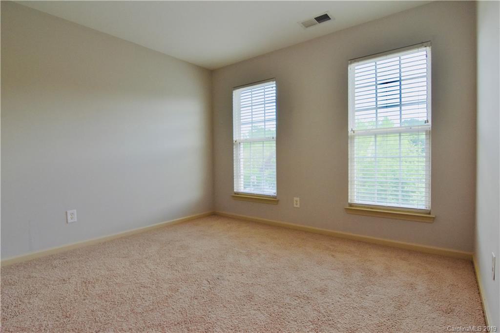 509 Circle Trace Road Monroe, NC 28110 - Photo 29 of 36 an empty room with windows