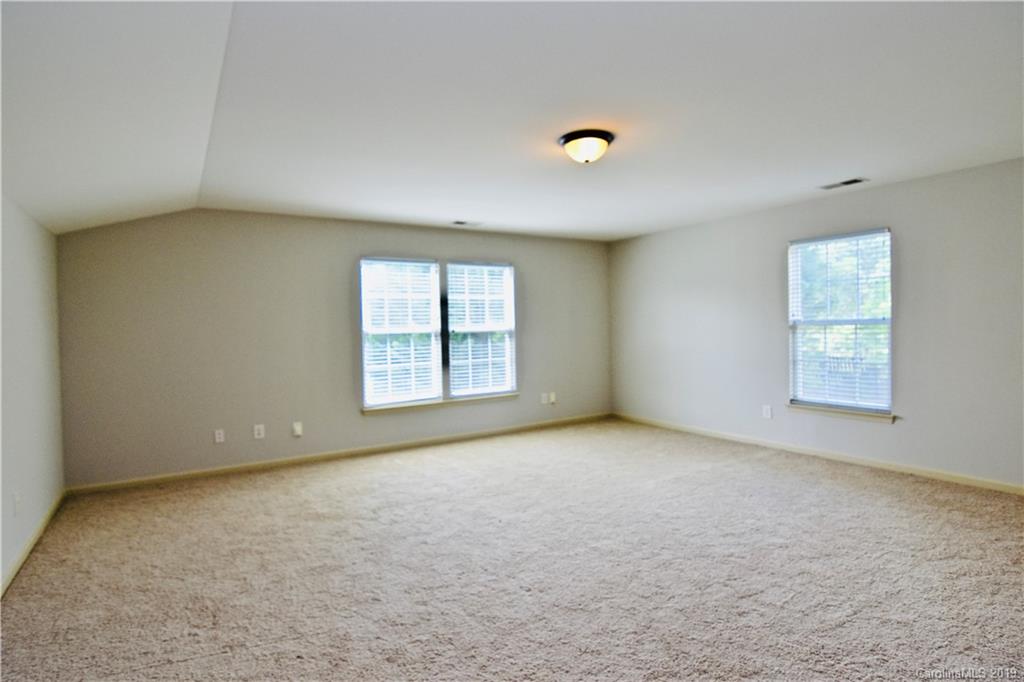 509 Circle Trace Road Monroe, NC 28110 - Photo 31 of 36 an empty room with windows
