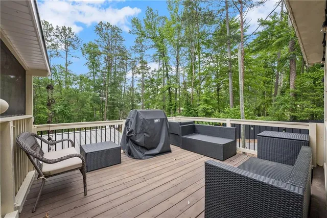 a view of balcony with furniture