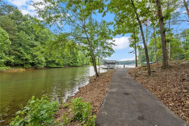 a view of a lake with a building in the background