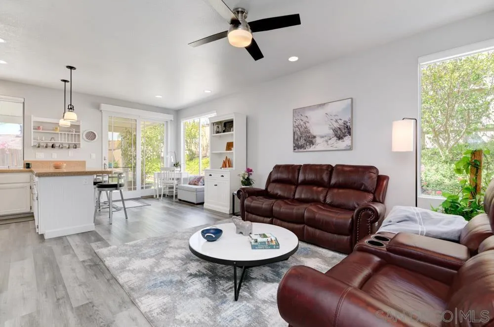 963 Martinique Drive Chula Vista, CA 91913 - Photo 18 of 37 a living room with furniture a ceiling fan and a window