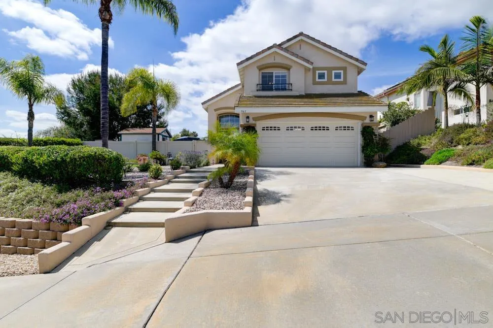 963 Martinique Drive Chula Vista, CA 91913 - Photo 2 of 37 a view of the house with a yard and potted plants