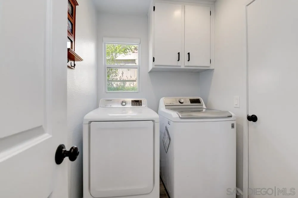 963 Martinique Drive Chula Vista, CA 91913 - Photo 27 of 37 a utility room with dryer and washer