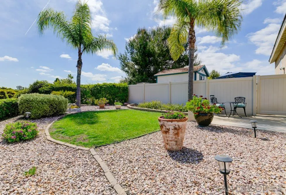 963 Martinique Drive Chula Vista, CA 91913 - Photo 4 of 37 a view of a backyard with a garden