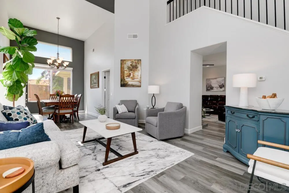 963 Martinique Drive Chula Vista, CA 91913 - Photo 7 of 37 a living room with furniture and wooden floor