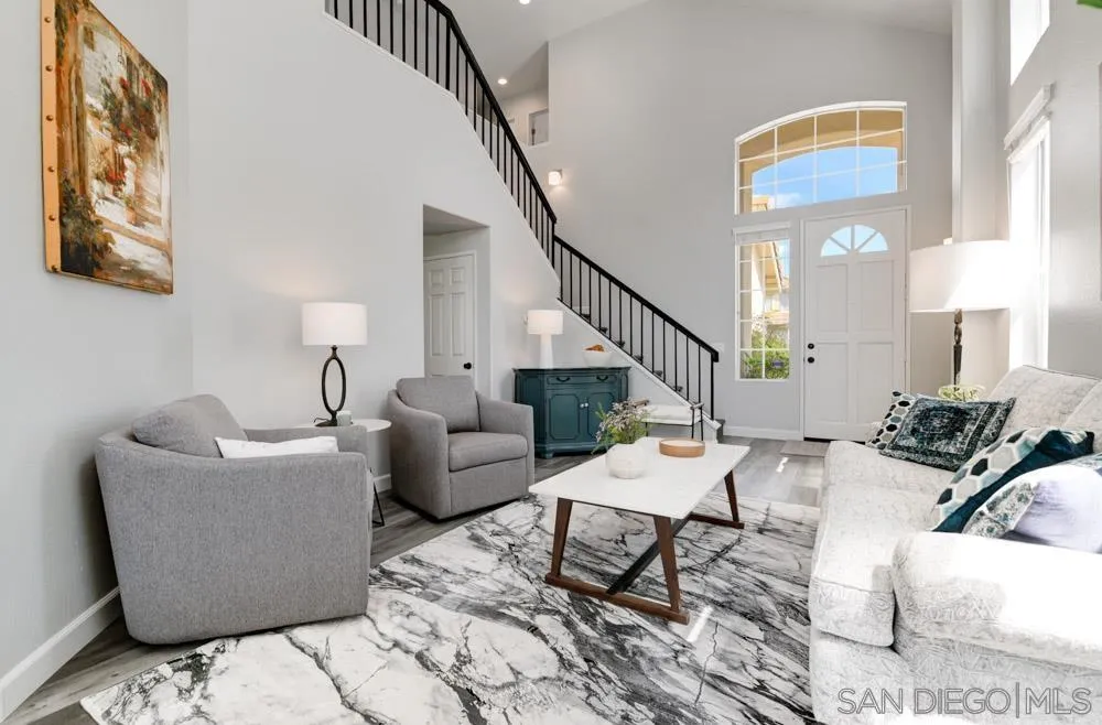 963 Martinique Drive Chula Vista, CA 91913 - Photo 9 of 37 a living room with furniture and a lamp
