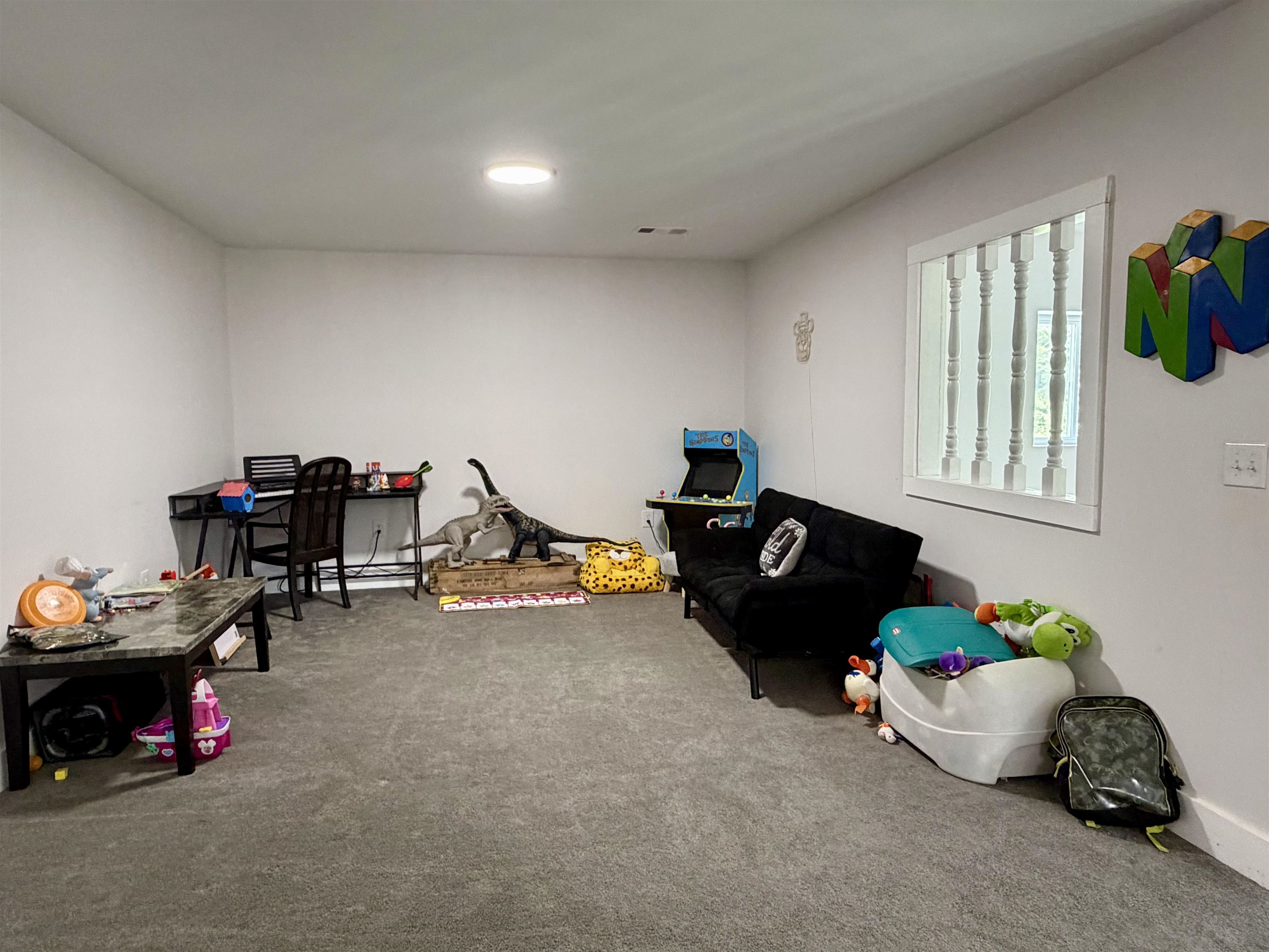 3670 Peavine Road Middleton, TN 38052 - Photo 31 of 36 Spacious room featuring neutral carpeting, light-toned walls, and recessed ceiling lighting