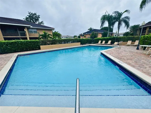 a view of a house with a swimming pool