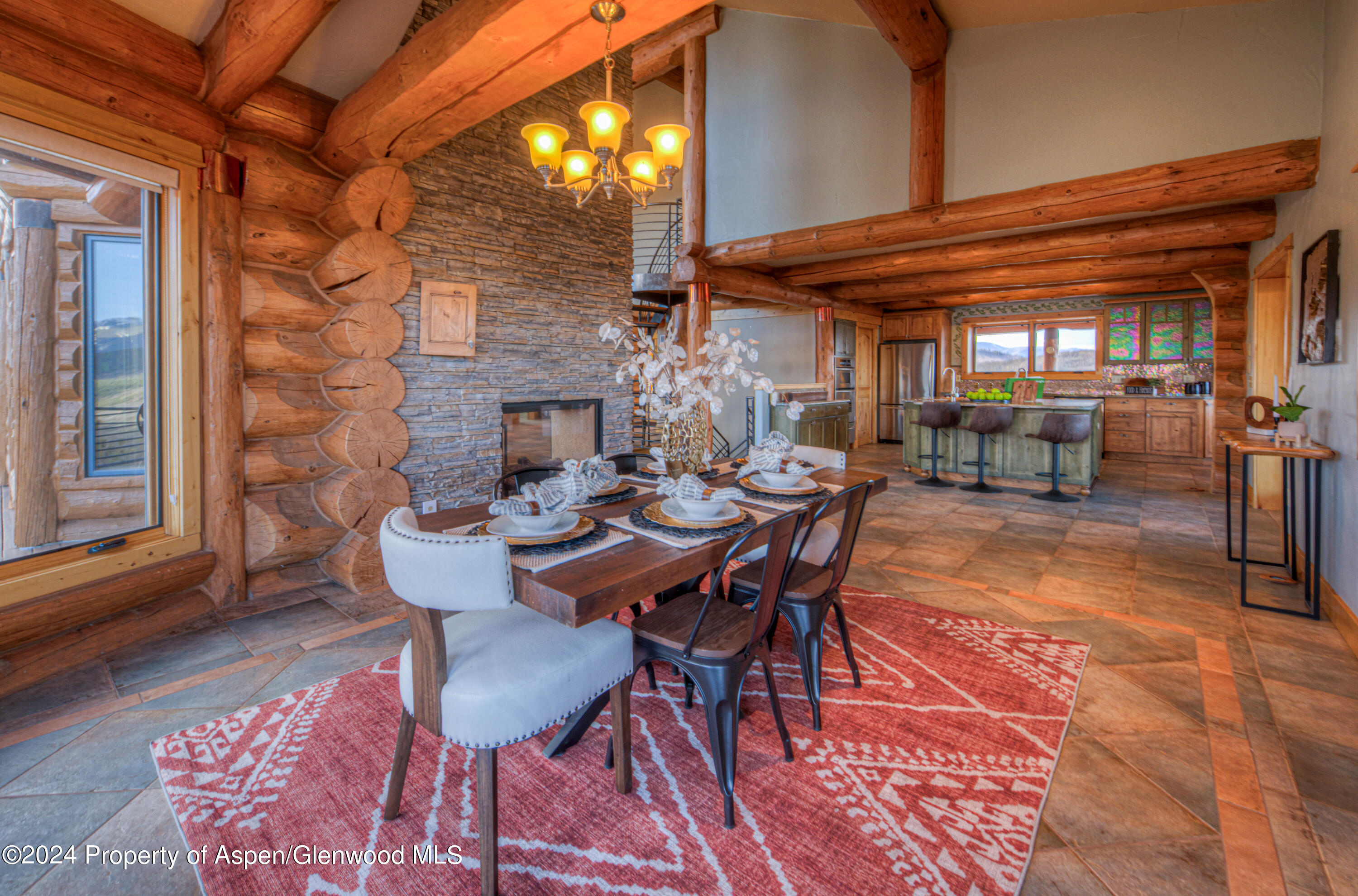1390 Mountain Valley Road La Veta, CO 81055 - Photo 15 of 43 a view of a patio with table and chairs and potted plants