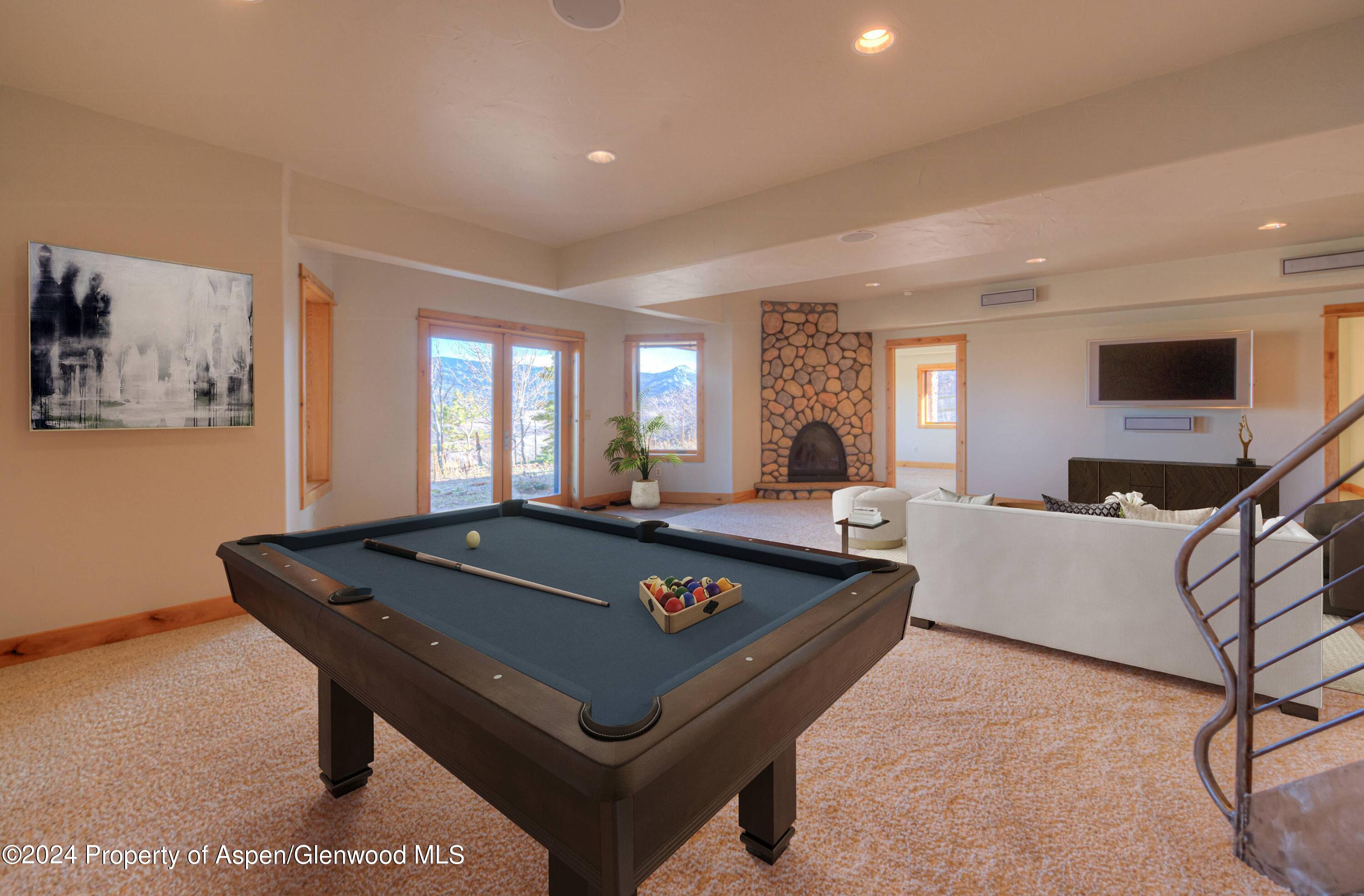 1390 Mountain Valley Road La Veta, CO 81055 - Photo 29 of 43 a room with furniture pool table and windows