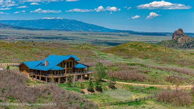 a view of a house with a ocean view