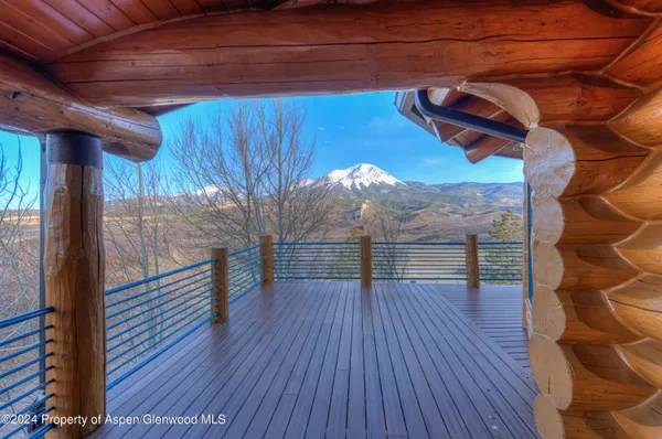 a view of outdoor space and wooden deck