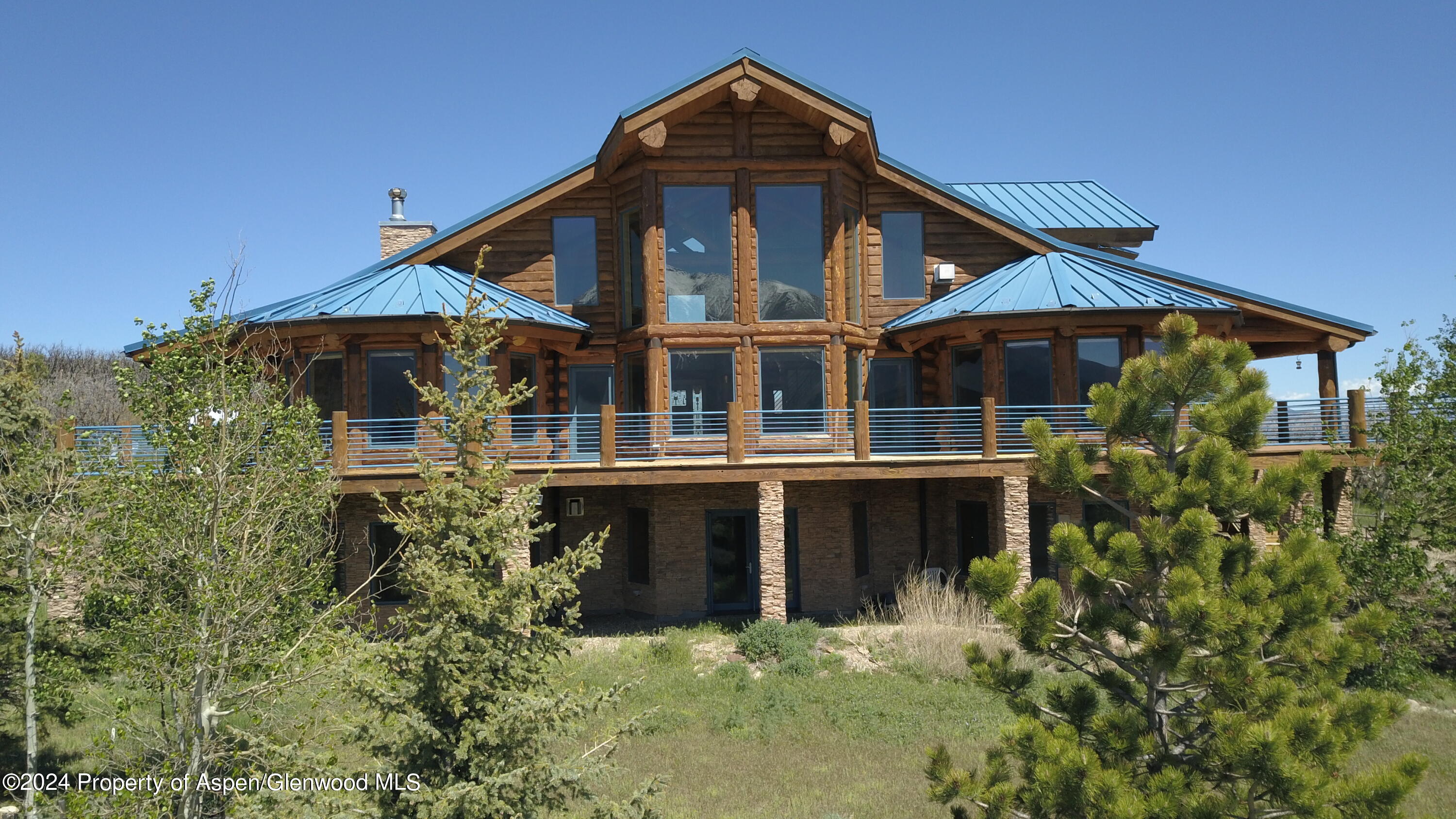 1390 Mountain Valley Road La Veta, CO 81055 - Photo 5 of 43 a front view of a house with a yard