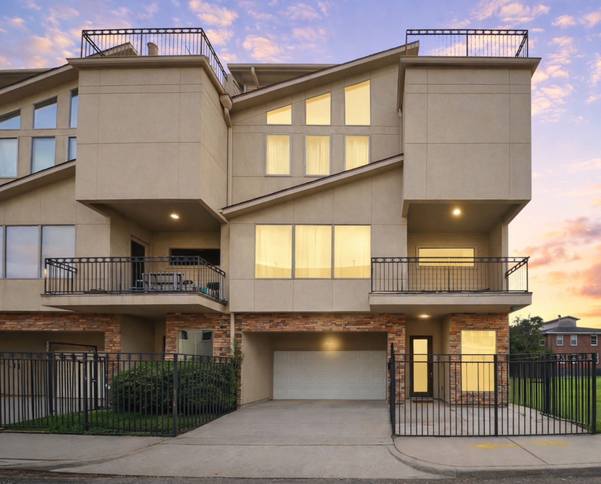 a front view of a house with a balcony