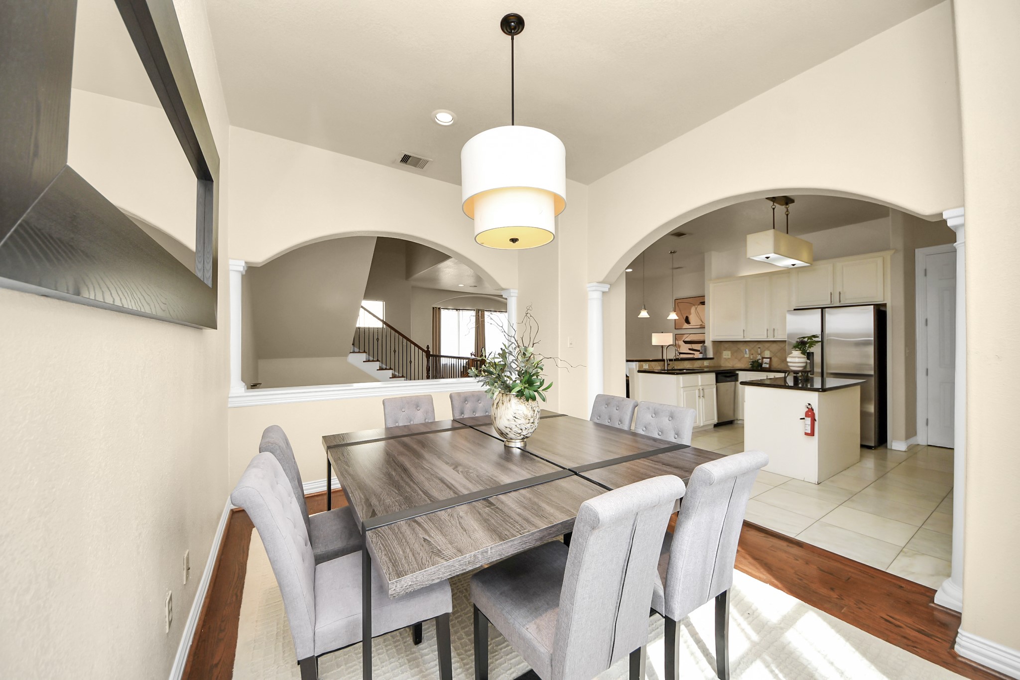 3507 Jackson Street Houston, TX 77004 - Photo 13 of 29 a view of a dining room with furniture and a chandelier