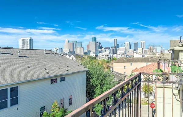 a view of a city from a balcony