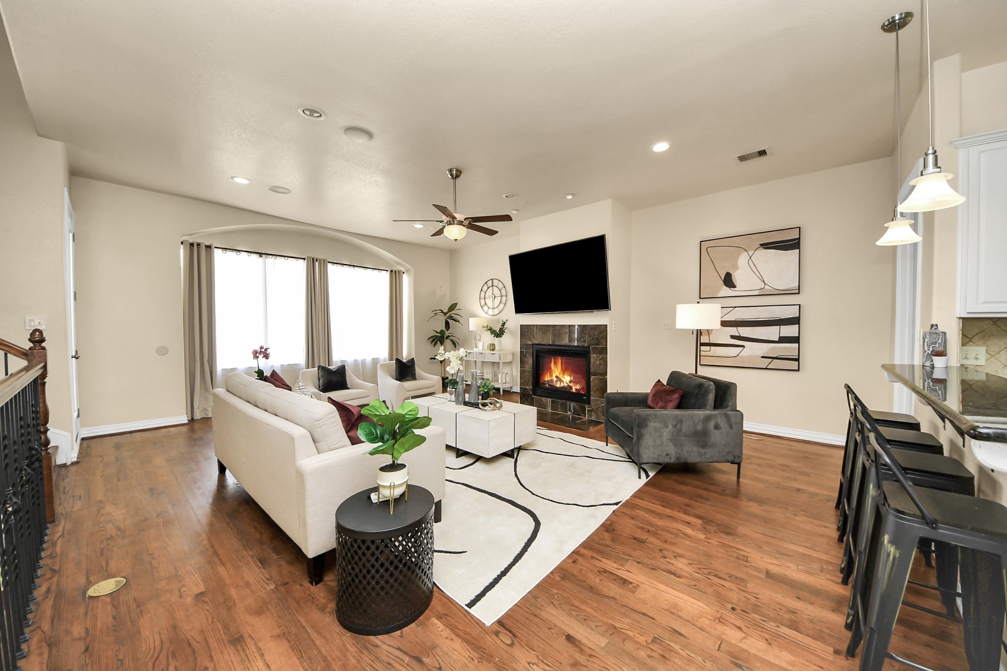 3507 Jackson Street Houston, TX 77004 - Photo 7 of 29 a living room with furniture a fireplace and a flat screen tv