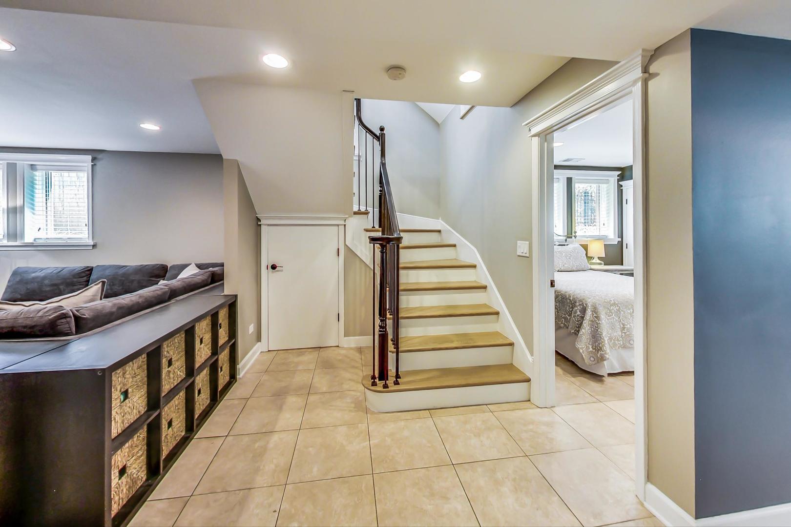 4133 North Kenneth Avenue Chicago, IL 60641 - Photo 33 of 54 a view of entryway with furniture and stairs
