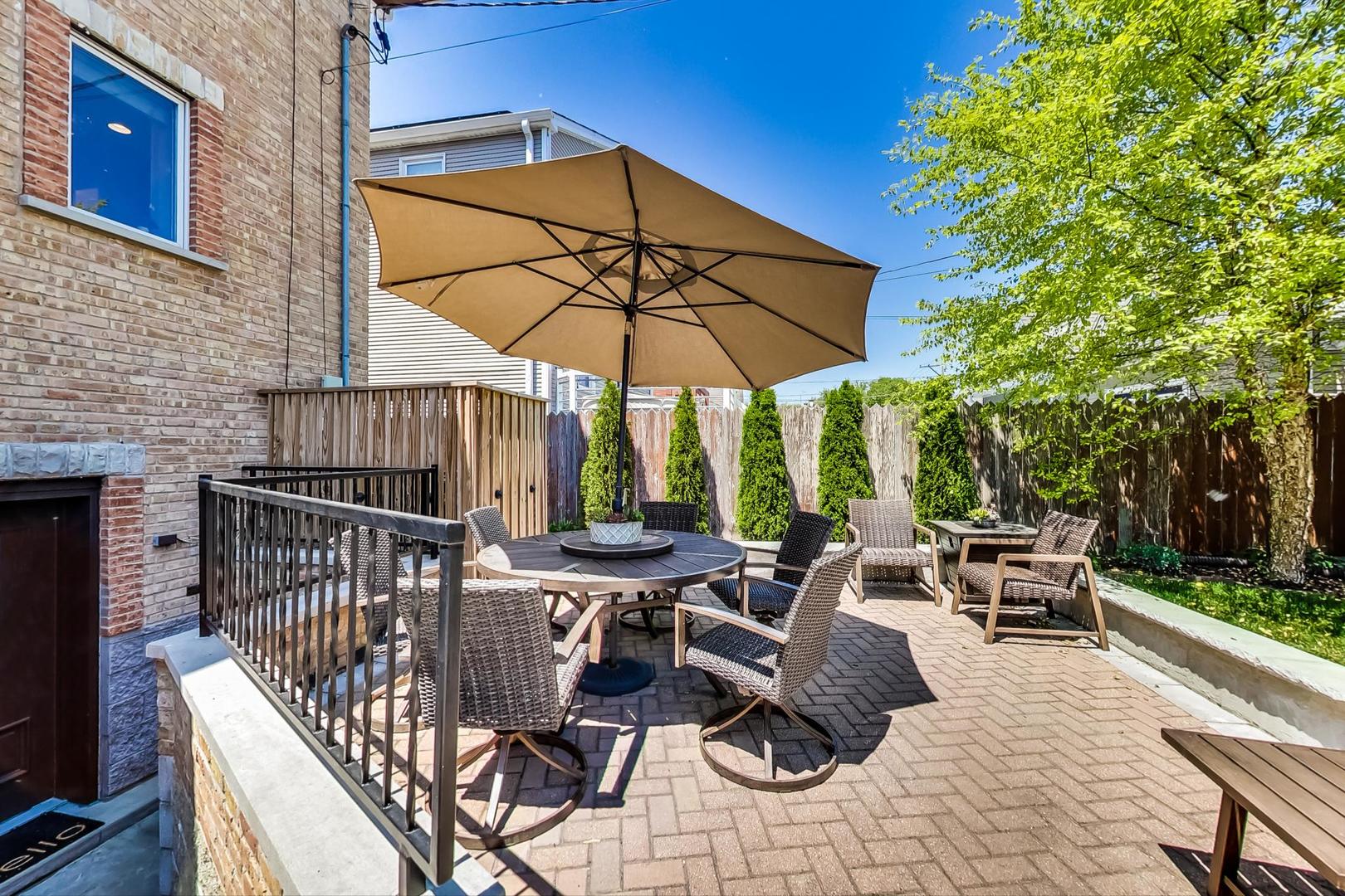 4133 North Kenneth Avenue Chicago, IL 60641 - Photo 48 of 54 a view of balcony with patio