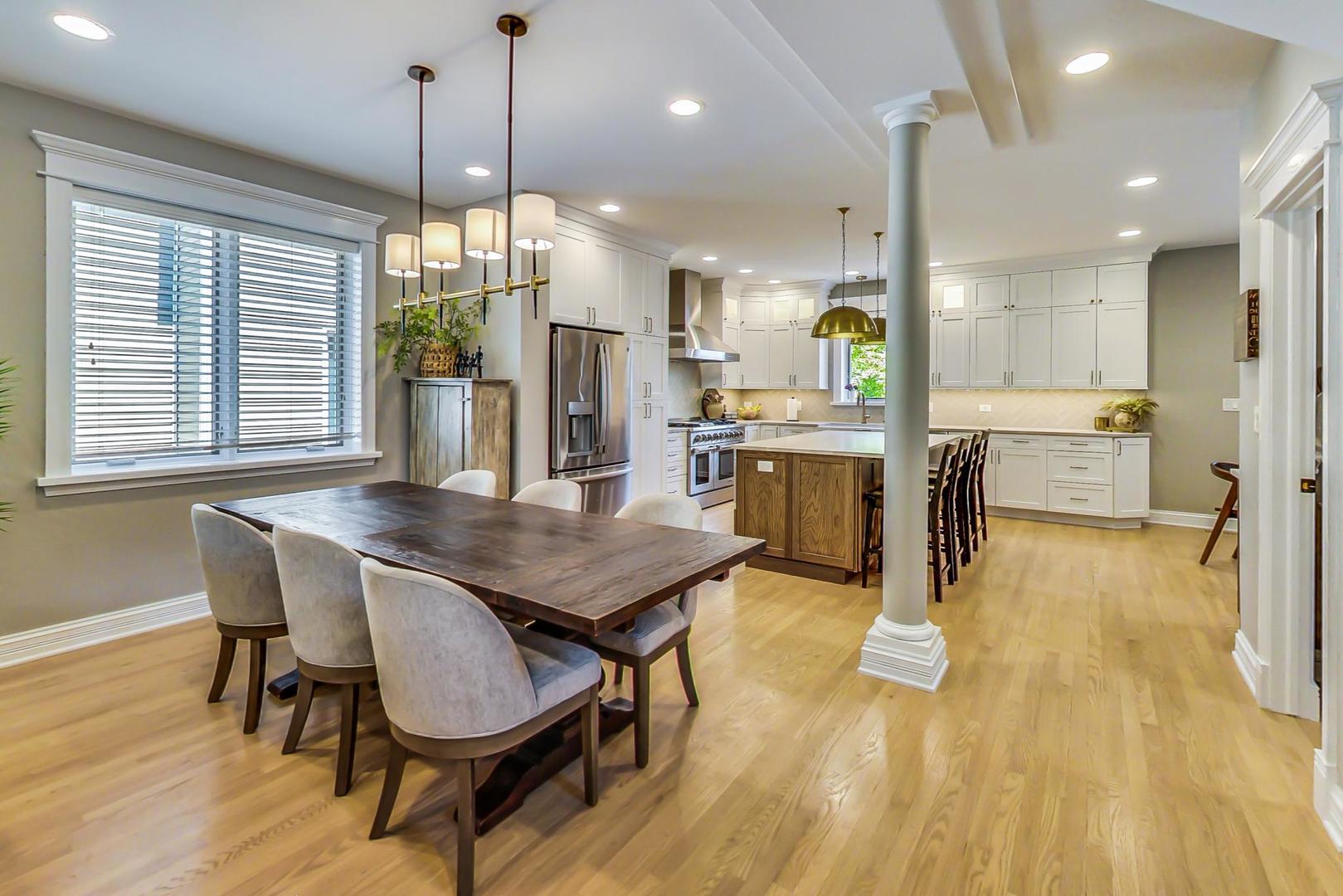 4133 North Kenneth Avenue Chicago, IL 60641 - Photo 10 of 54 a dining room with furniture and wooden floor