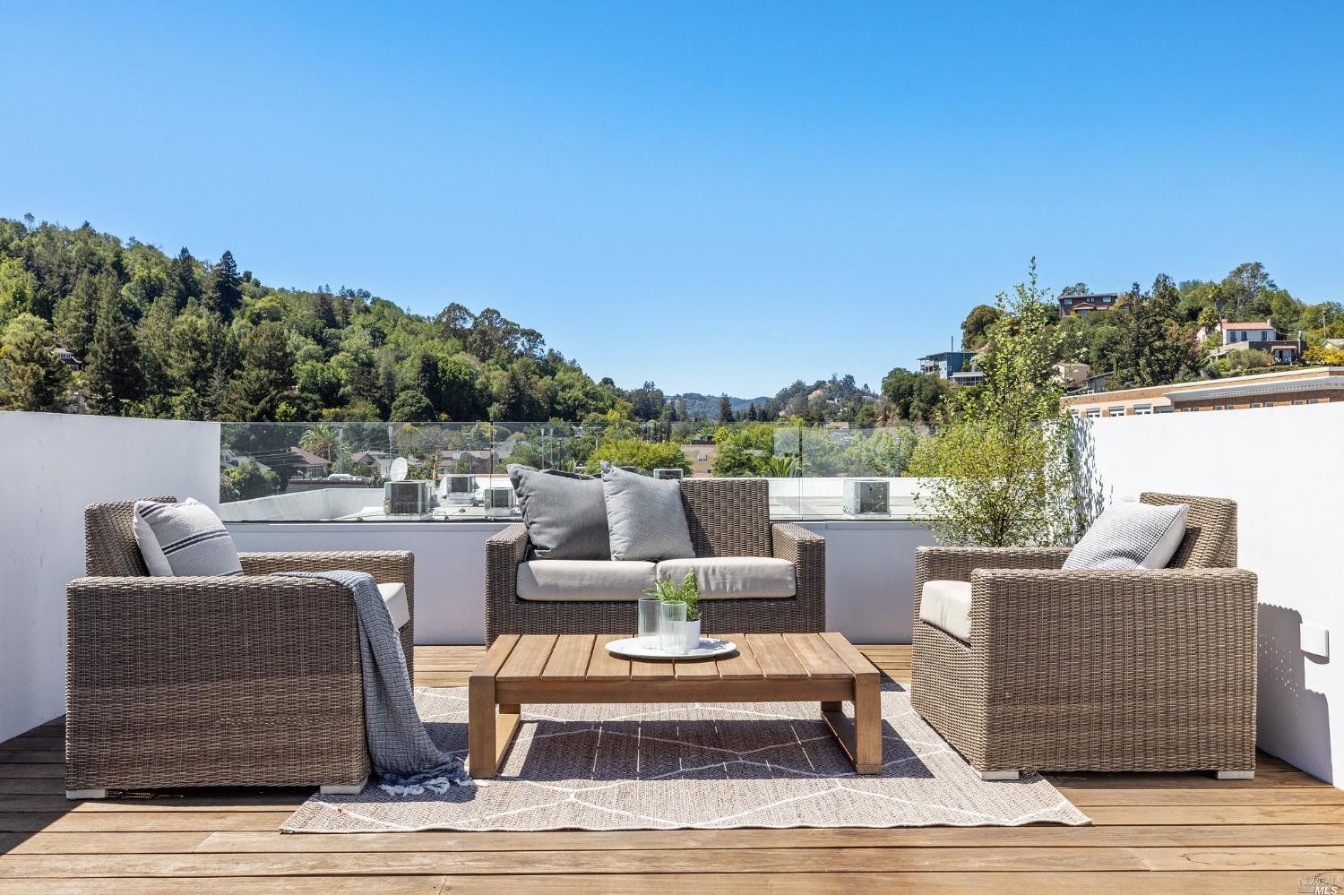 30 Ida Street San Rafael, CA 94901 - Photo 1 of 1 a view of roof deck with couches and city view