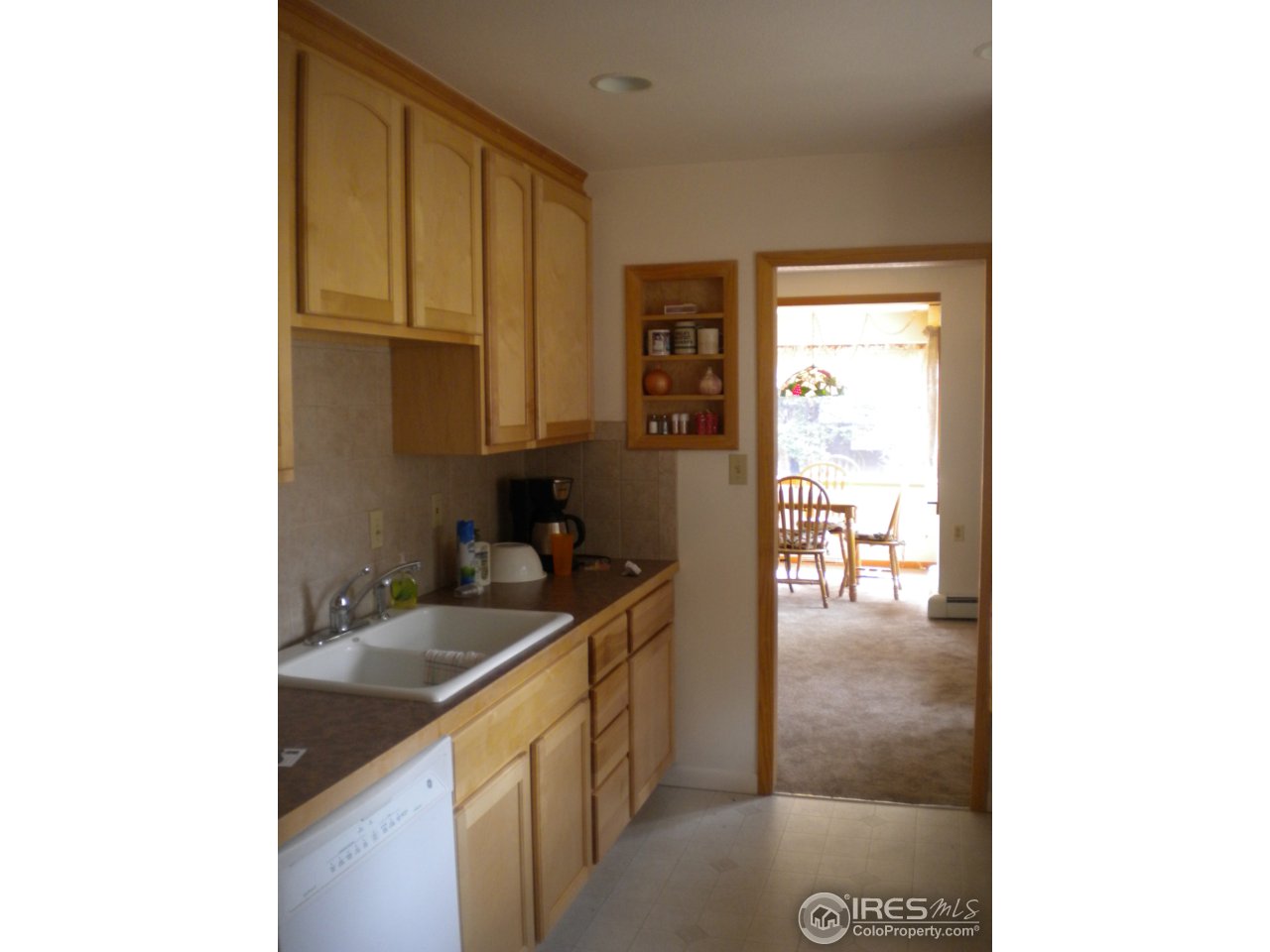 2834 Riverside Drive Lyons, CO 80540 - Photo 5 of 13 a kitchen with a sink and cabinets