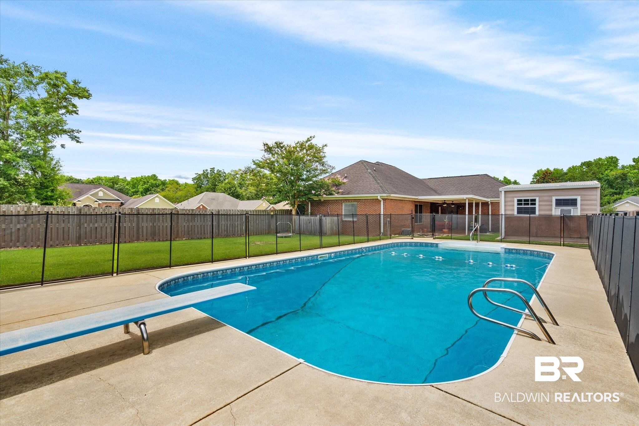 1561 William Dunn Way Mobile, AL 36695 - Photo 2 of 28 View of pool with a diving board and a yard