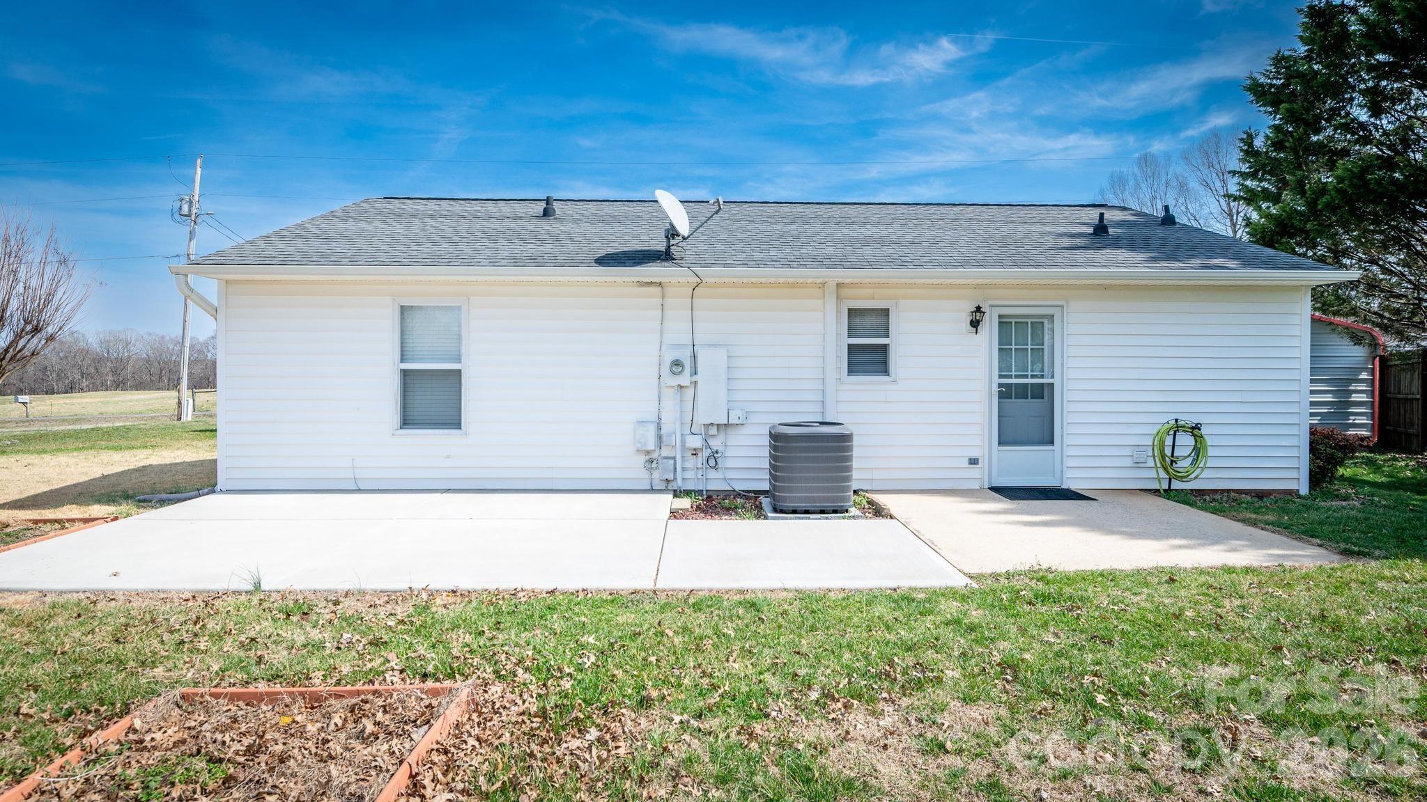370 Weathers Creek Road Troutman, NC 28166 - Photo 5 of 10 a view of a house with backyard
