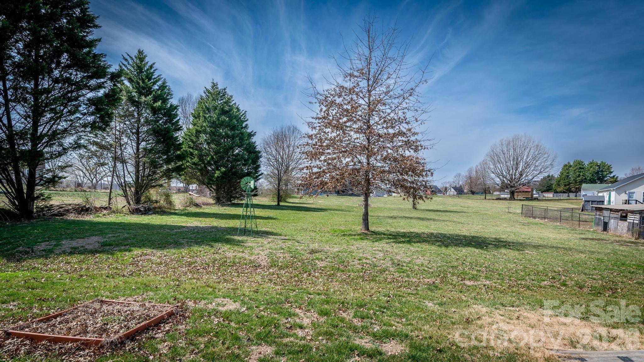370 Weathers Creek Road Troutman, NC 28166 - Photo 8 of 10 a view of a trees in a park