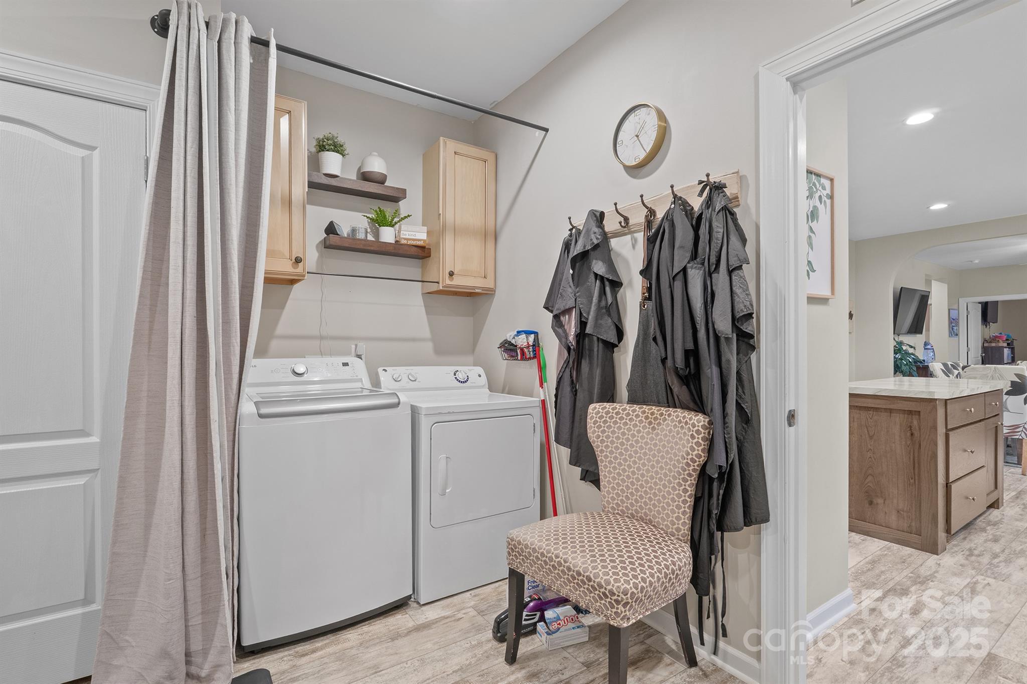 486 Stutts Road Mooresville, NC 28117 - Photo 15 of 35 a view of walk in closet with clothes and shoes