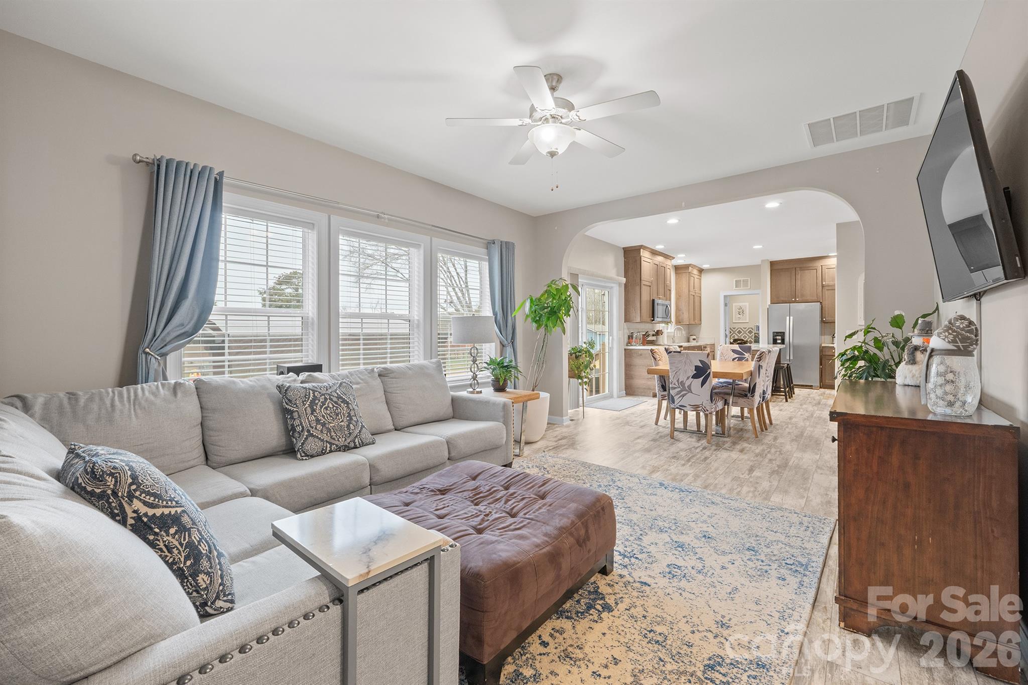 486 Stutts Road Mooresville, NC 28117 - Photo 18 of 35 a living room with furniture and a large window