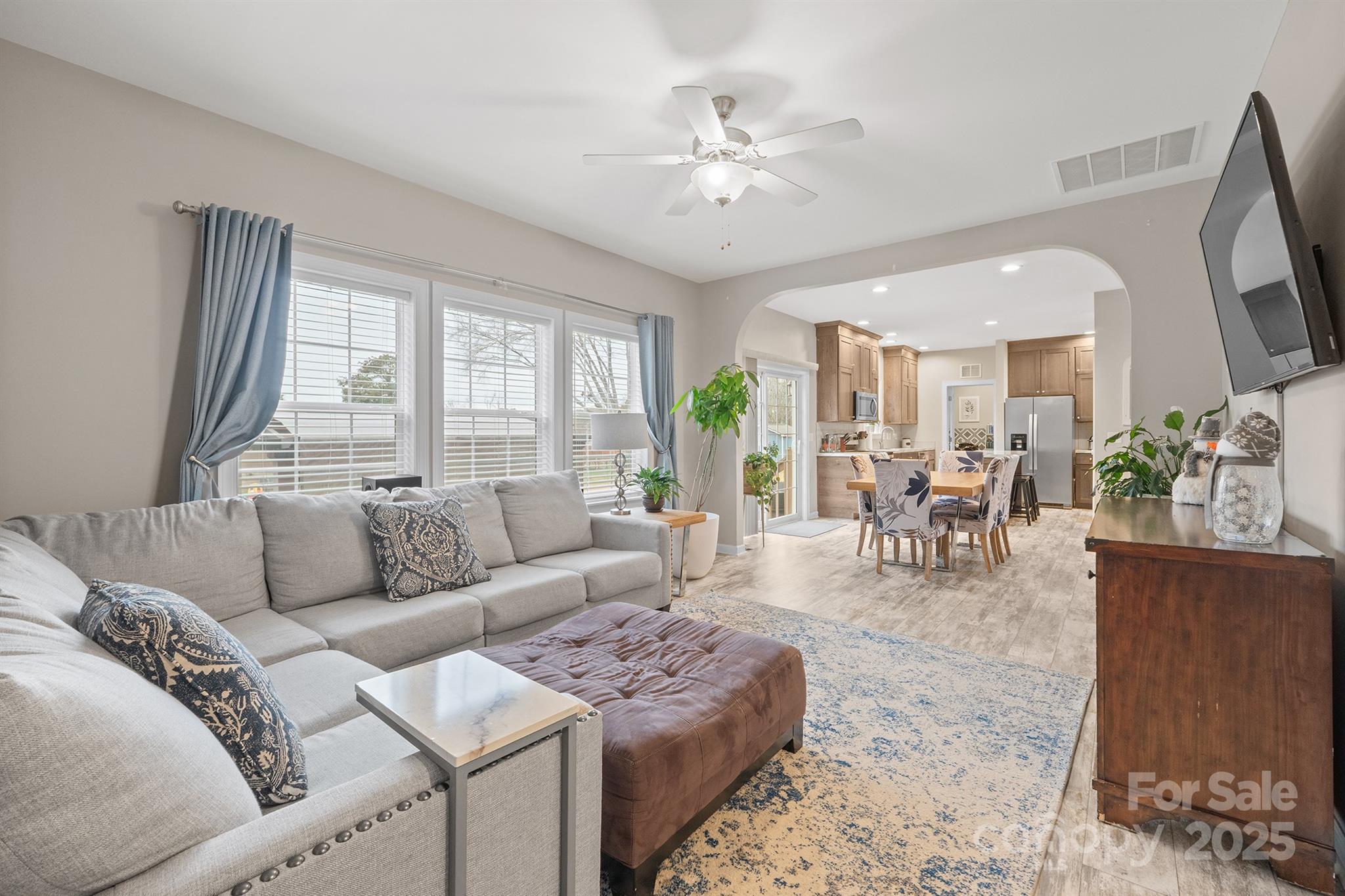 486 Stutts Road Mooresville, NC 28117 - Photo 19 of 35 a living room with furniture and a large window