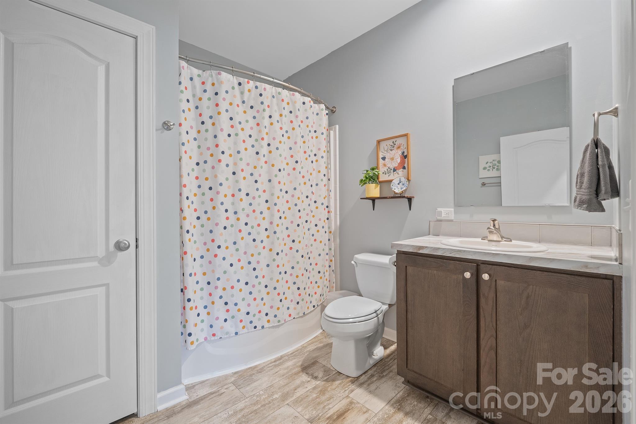 486 Stutts Road Mooresville, NC 28117 - Photo 30 of 35 a bathroom with a sink toilet and shower