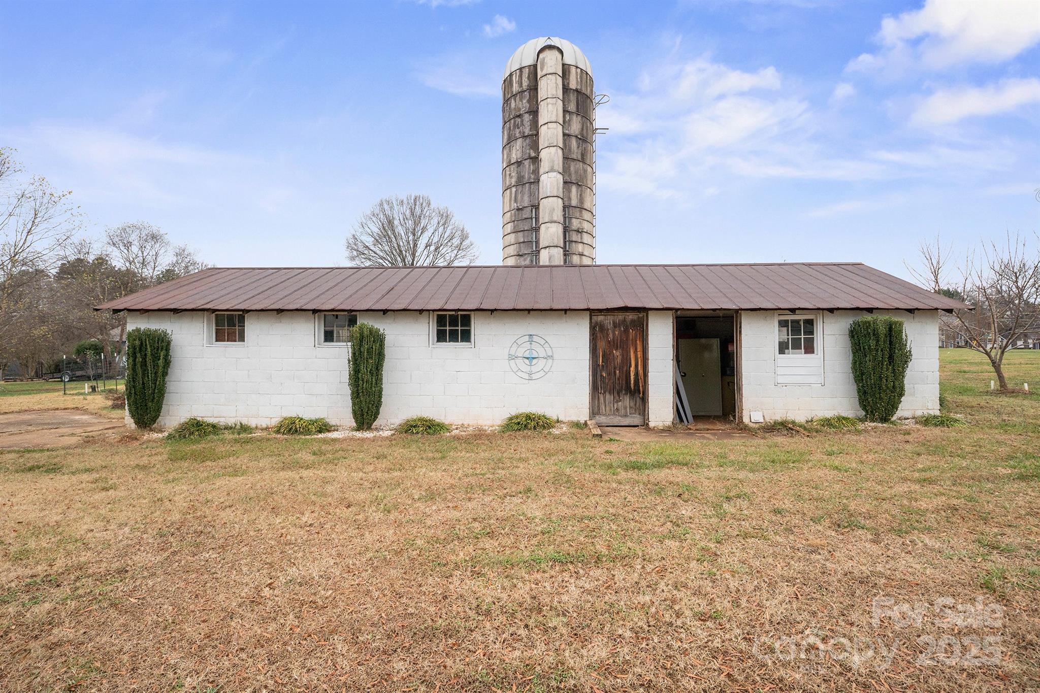 486 Stutts Road Mooresville, NC 28117 - Photo 3 of 35 a view of a house with a yard and garage