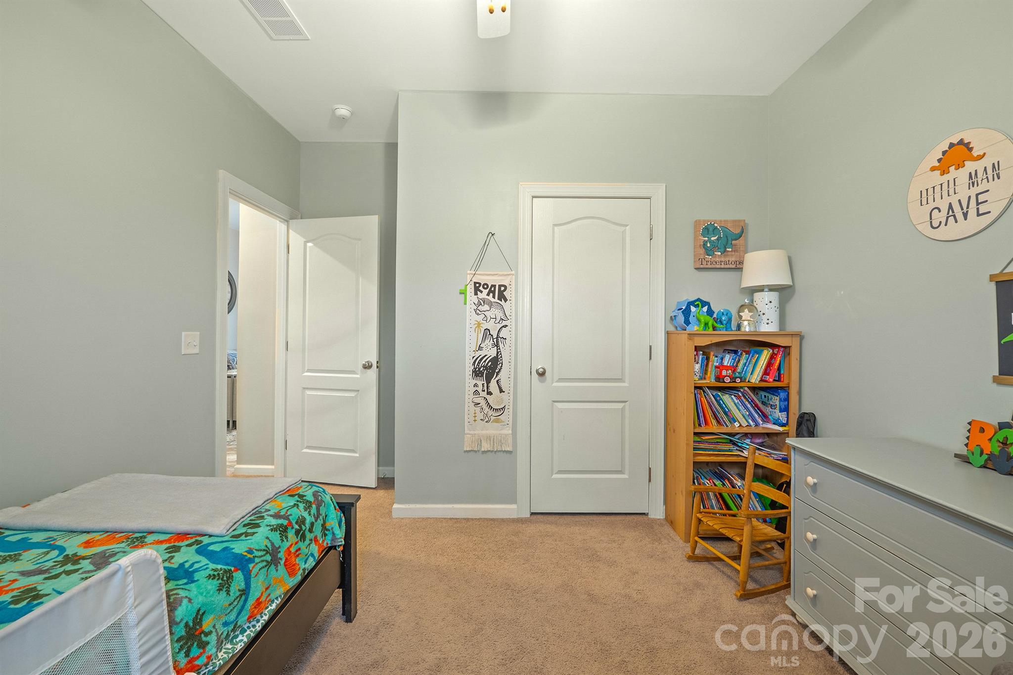 486 Stutts Road Mooresville, NC 28117 - Photo 31 of 35 a bedroom with a bed and a window