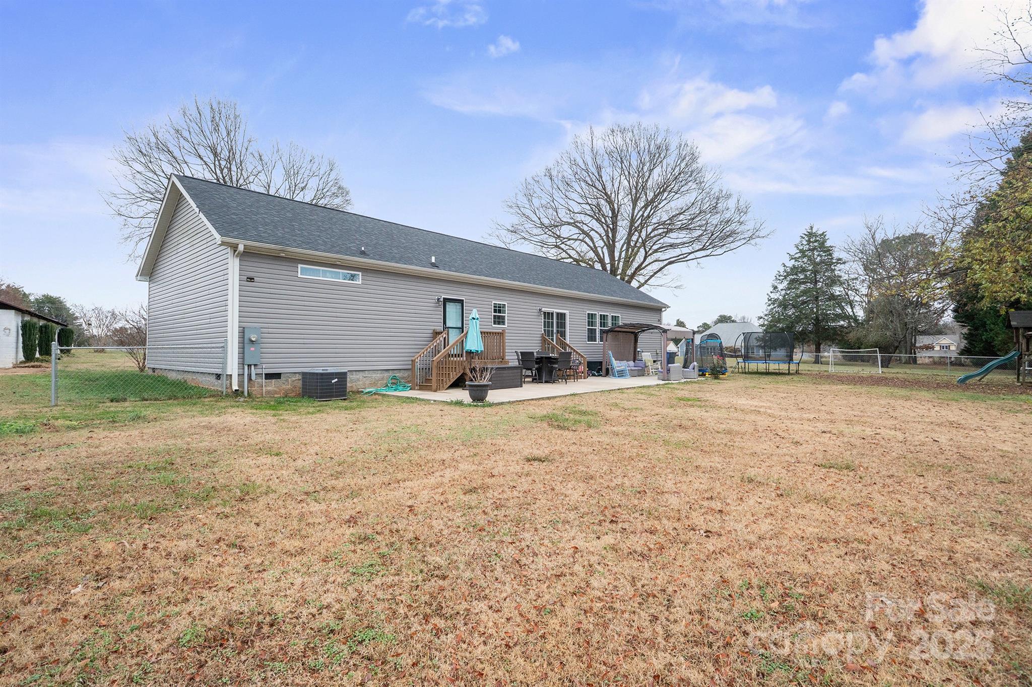 486 Stutts Road Mooresville, NC 28117 - Photo 34 of 35 a house view with a outdoor space