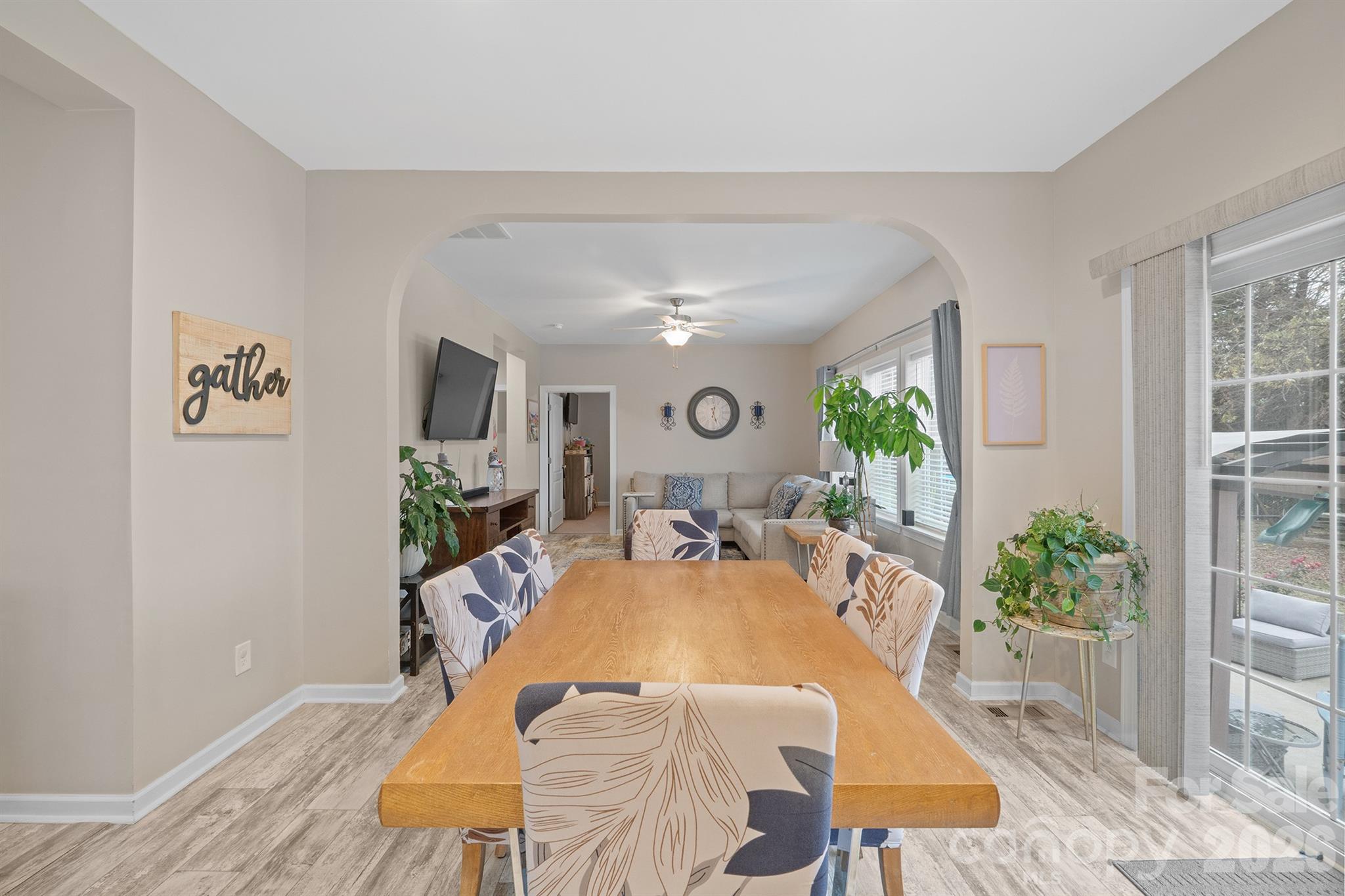 486 Stutts Road Mooresville, NC 28117 - Photo 7 of 35 a view of a dining room with furniture