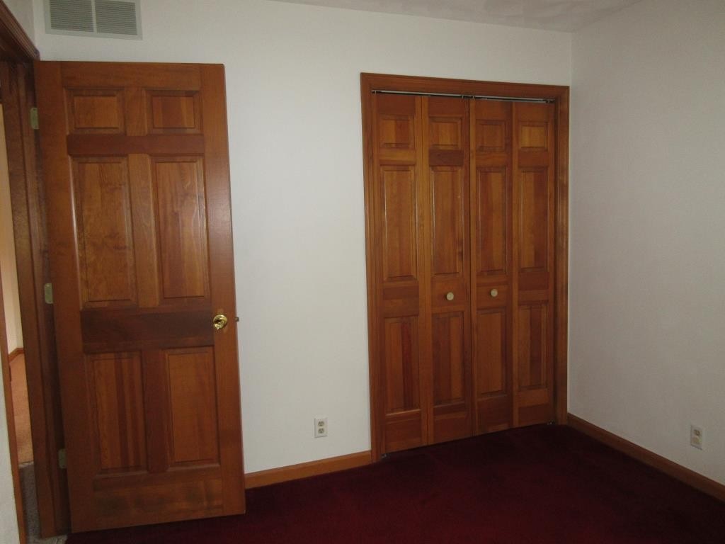 3917 Montclair Road Roscoe, IL 61073 - Photo 14 of 18 an empty room with closet
