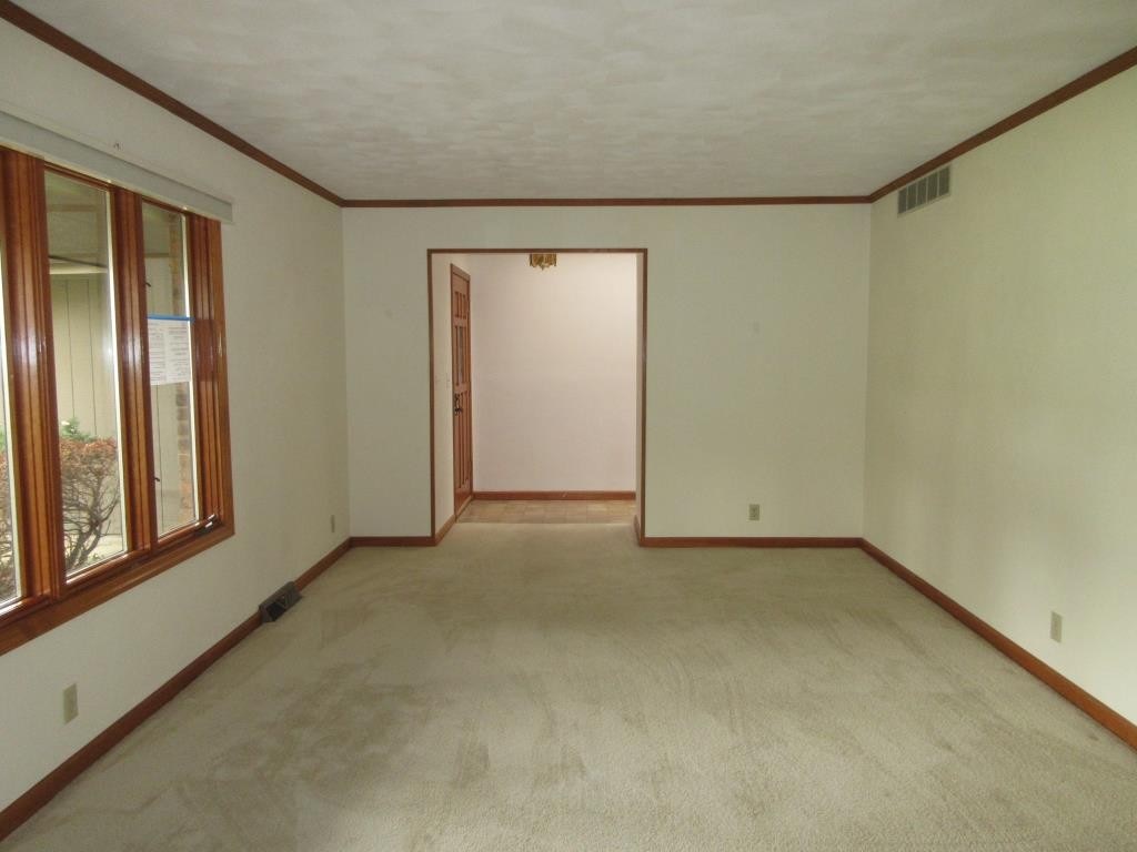 3917 Montclair Road Roscoe, IL 61073 - Photo 6 of 18 an empty room with windows