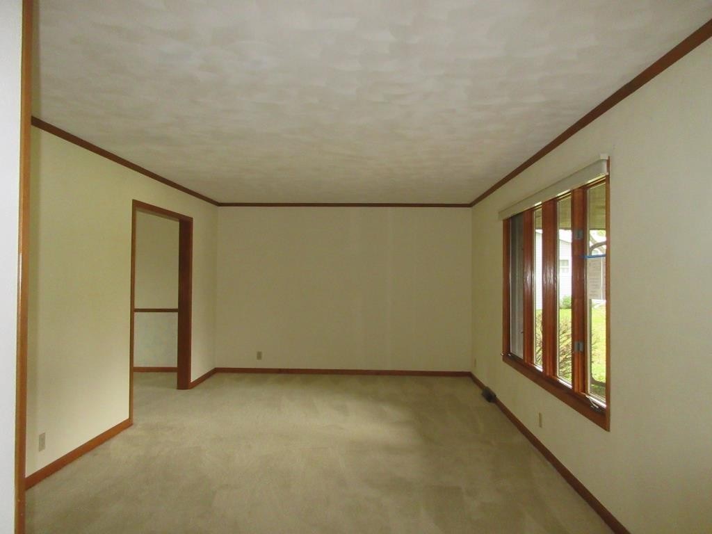 3917 Montclair Road Roscoe, IL 61073 - Photo 7 of 18 an empty room with windows