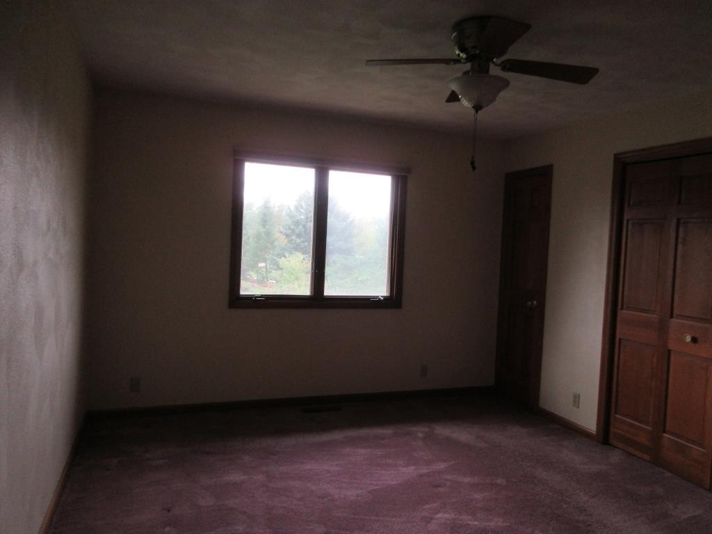 3917 Montclair Road Roscoe, IL 61073 - Photo 10 of 18 an empty room with a empty space and windows