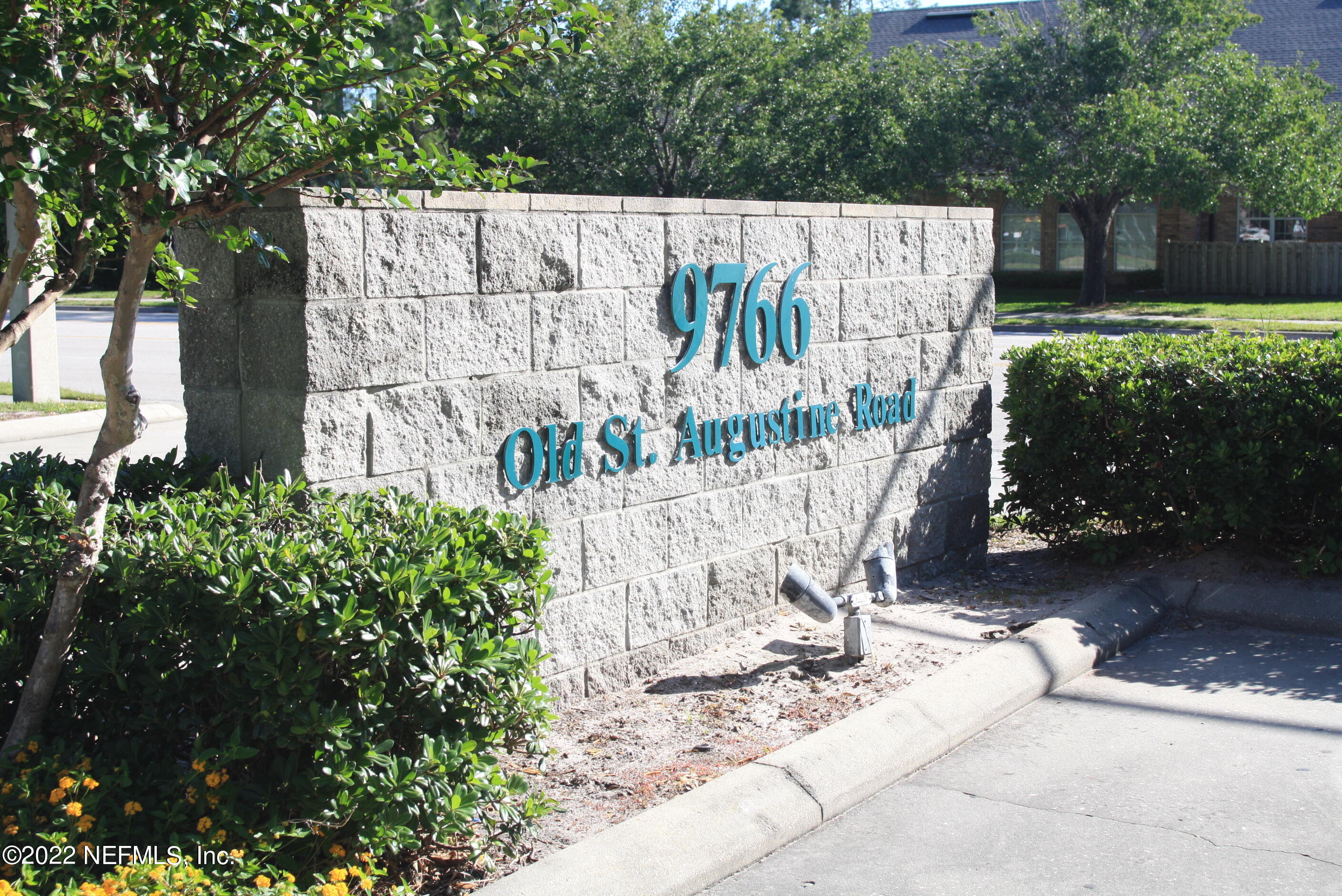 9766 Old St Augustine Road, Unit 7 Jacksonville, FL 32257 - Photo 6 of 9 a sign that is on the side of the road