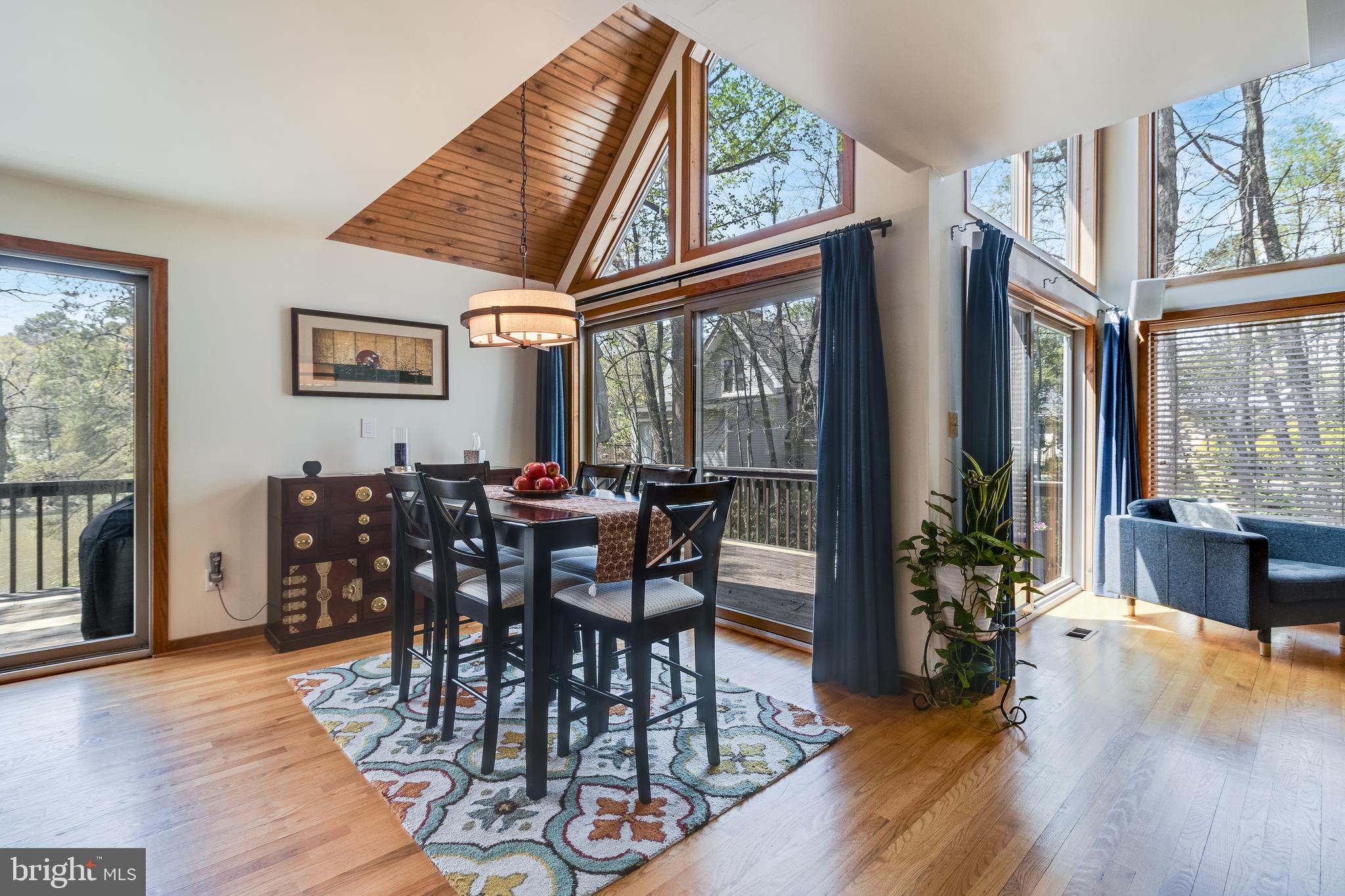 247 Frontier Trail Lusby, MD 20657 - Photo 12 of 62 a view of a dining room with furniture window and wooden floor
