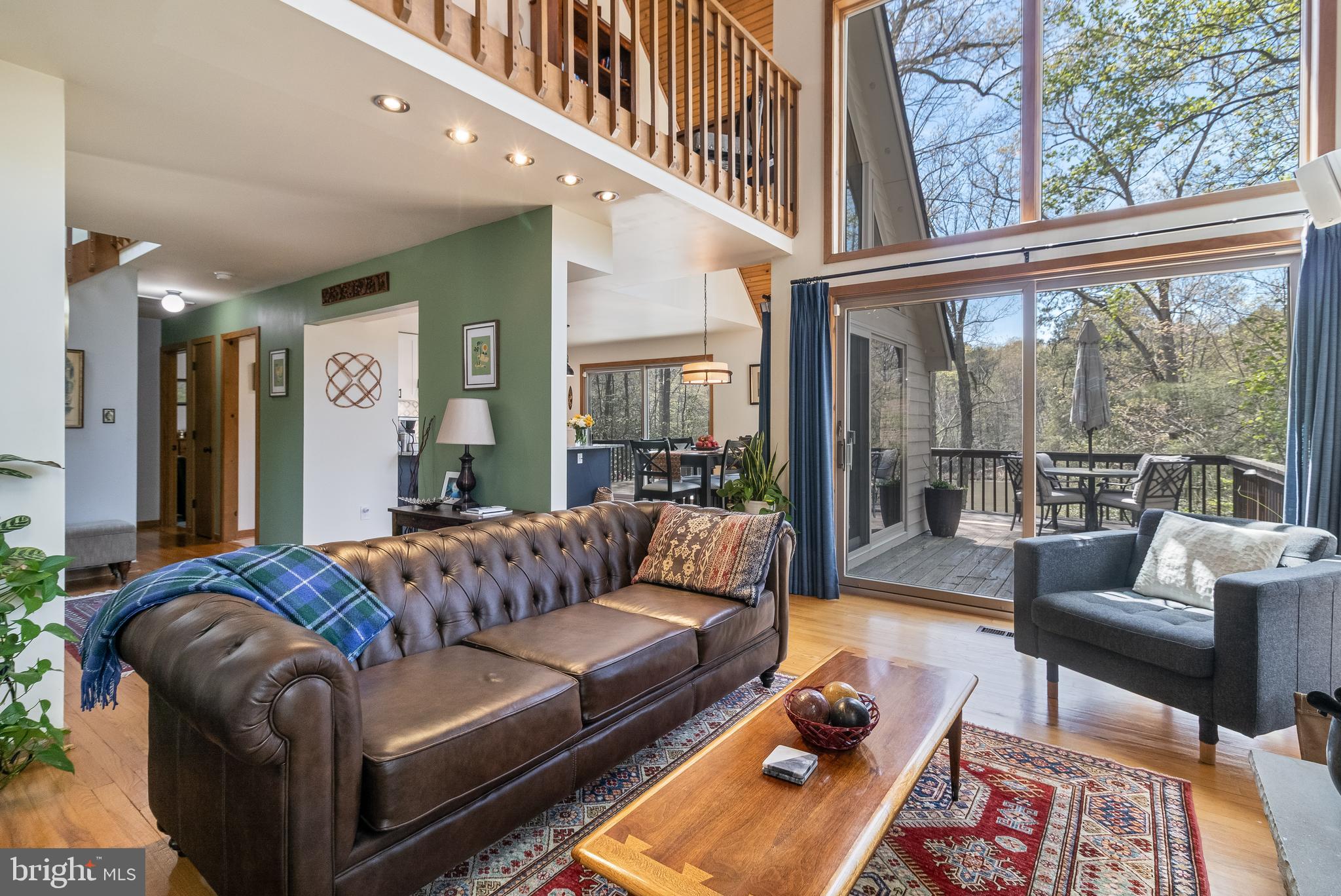 247 Frontier Trail Lusby, MD 20657 - Photo 13 of 62 a living room with furniture and a large window