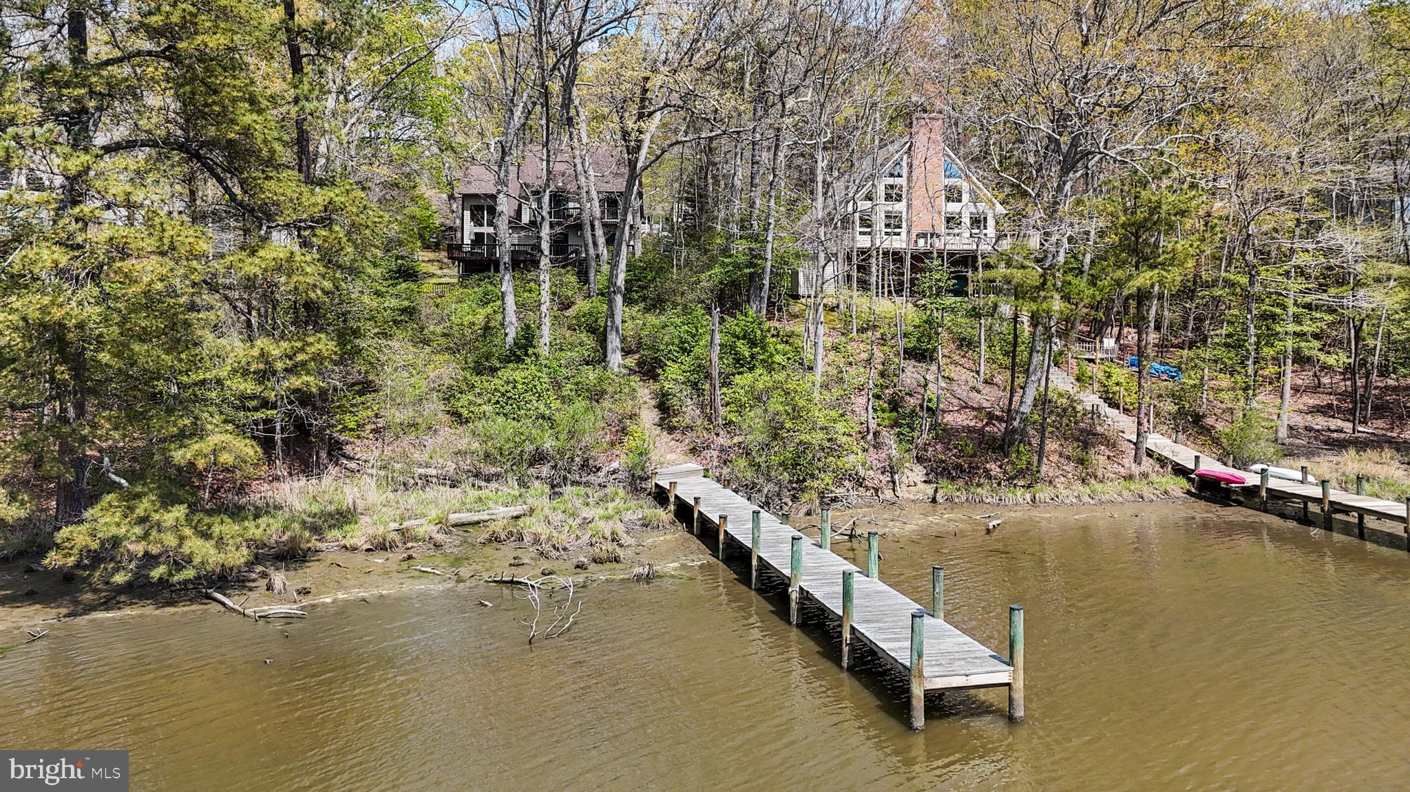 247 Frontier Trail Lusby, MD 20657 - Photo 2 of 62 a view of residential houses with outdoor space